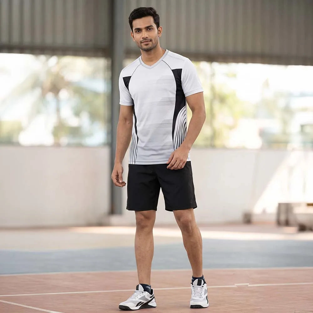 Model wearing Silver Curve silver V-neck jersey with black curved panels