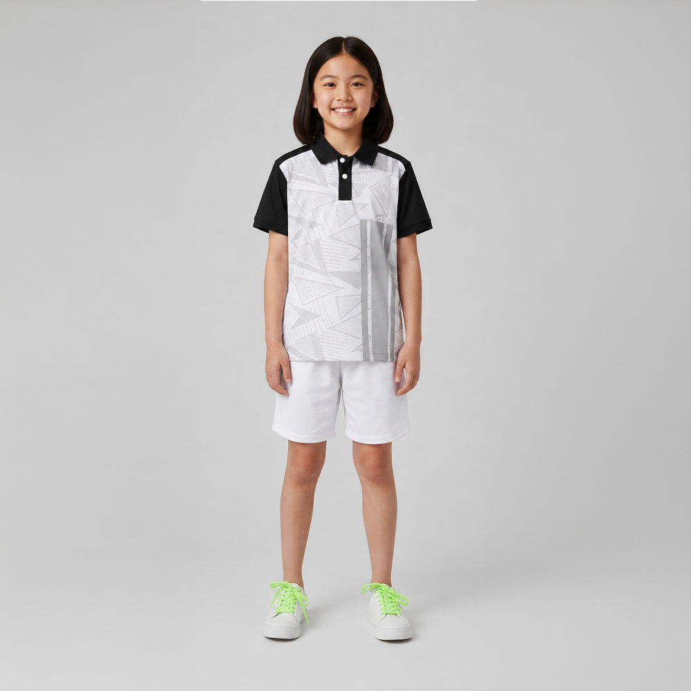 Kids model wearing black white geometric jersey and white shorts set