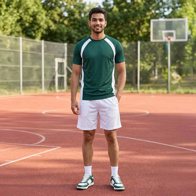 Man on a basketball court wearing a forest green round-neck jersey with white shoulder stripes and white shorts