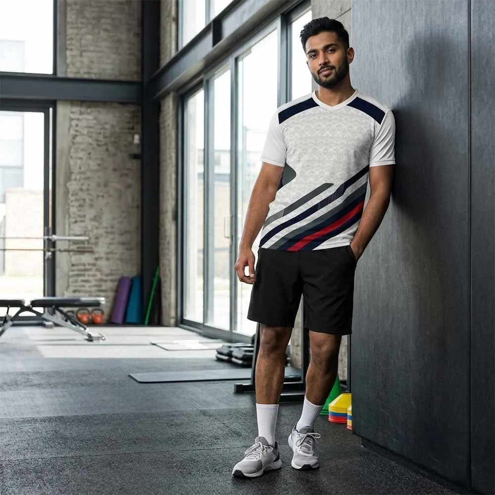 Model wearing Navy Strike navy-striped V-neck jersey with black shorts