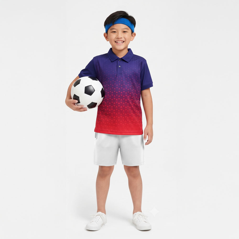 Kids model wearing navy red gradient jersey and white shorts set