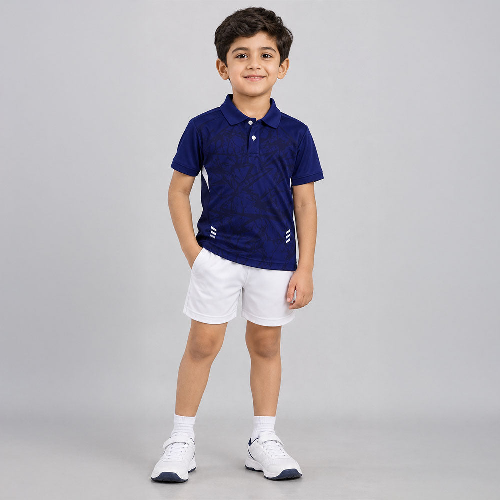 Kids model wearing navy camo jersey and white shorts set