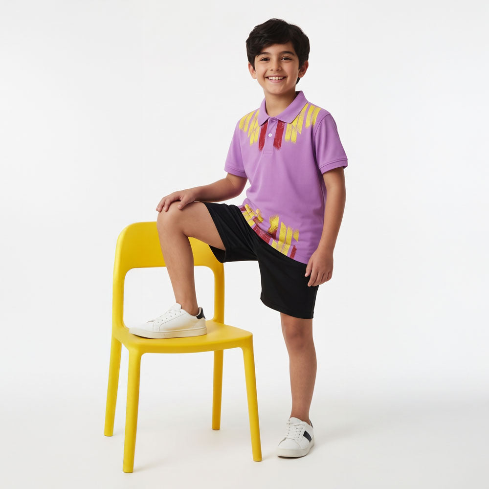 Kids model wearing lilac flame print jersey and black shorts set