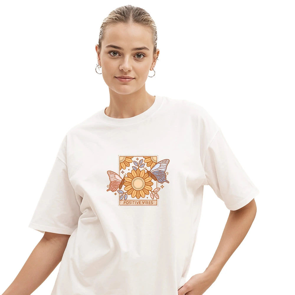 oversized t-shirt for women, buy oversized t-shirts online, drop shoulder tee, graphic t-shirt, cotton t-shirt for women, positive vibes tee, butterfly print tee, casual streetwear, travel outfit for women, oversized