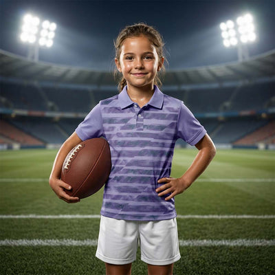 Kids' polo sports jersey in lavender grey with dark horizontal graphic stripes, worn by a child in white shorts holding an oval ball in a stadium.