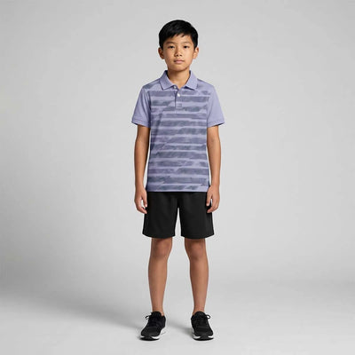 Child wearing the lavender grey with horizontal graphic stripes polo jersey with black shorts, standing in a studio.